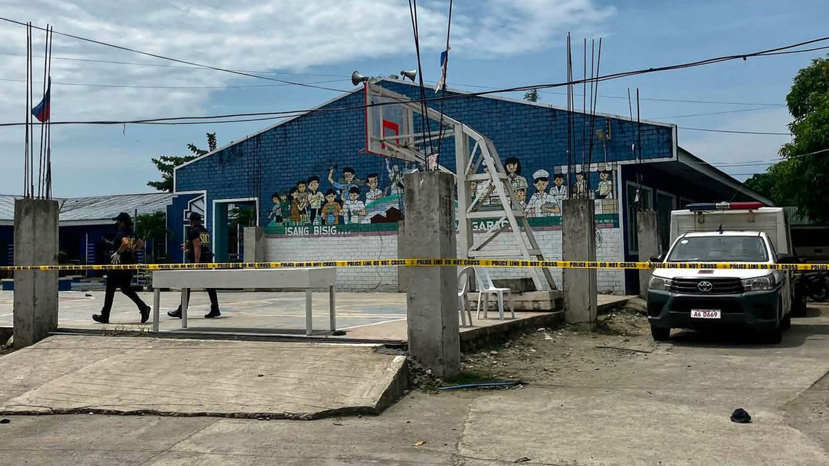 Philippines reels from school shooting as two teenage students arrested in Tacloban attack that kills three